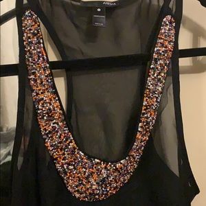 Beaded sheer black top